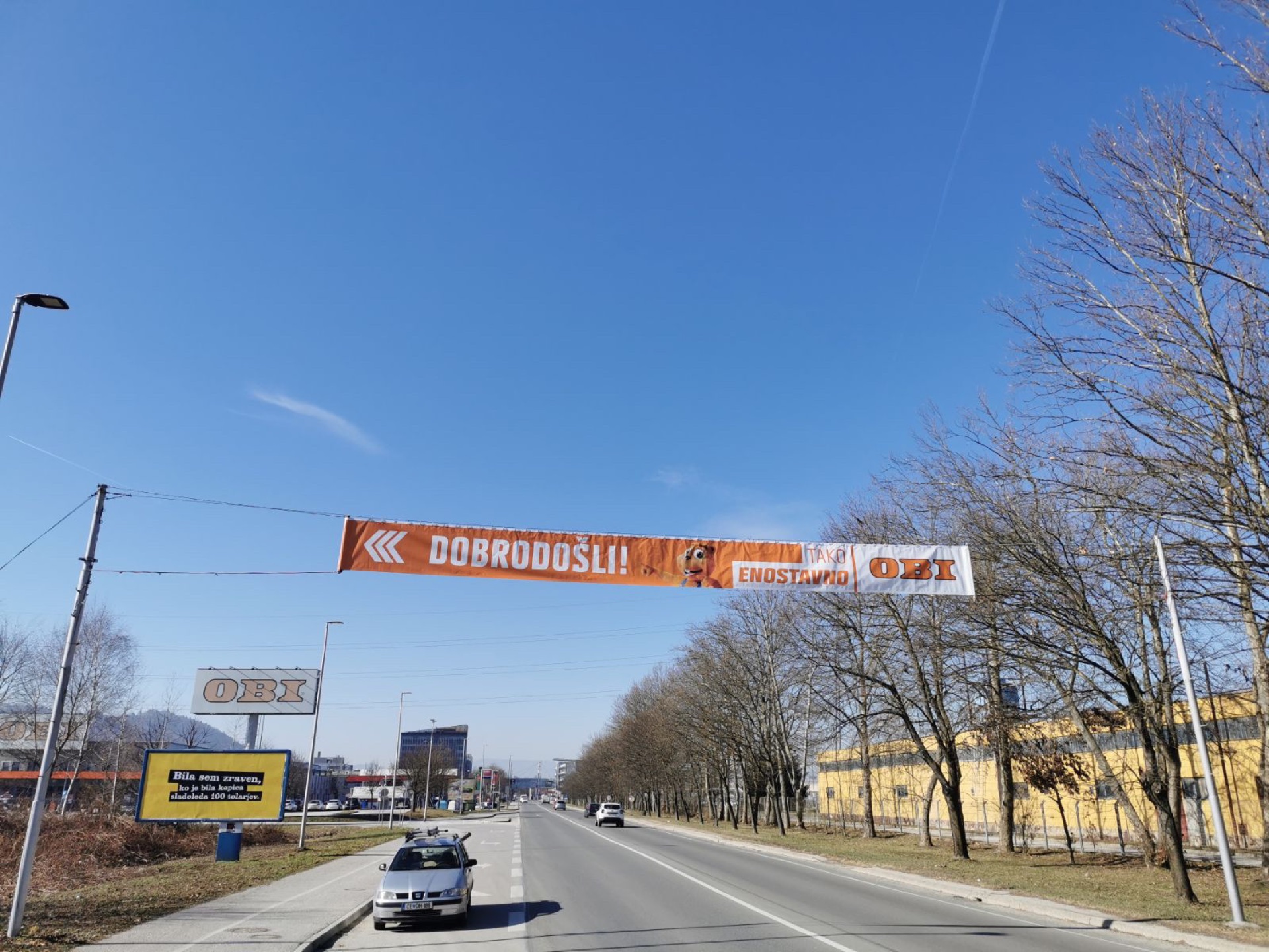Cestni reklamni transparent Dobrodošli OBI — Reklama Celje